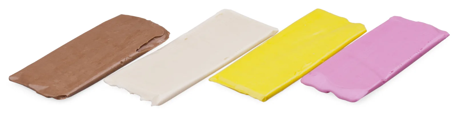 Four flat pieces of Turkish taffy in brown, white, yellow, and pink on a white background